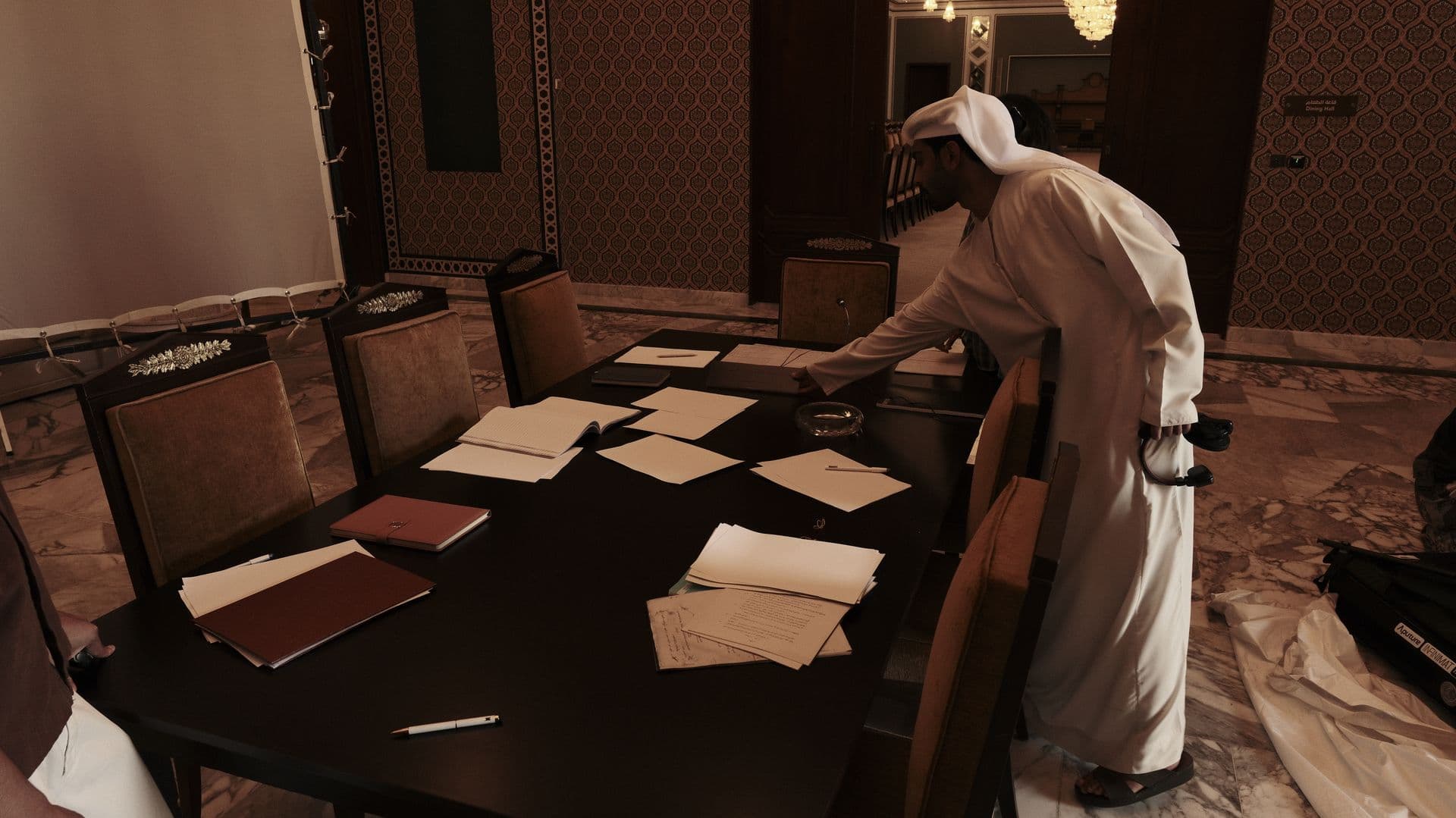 A man reading documents at a desk